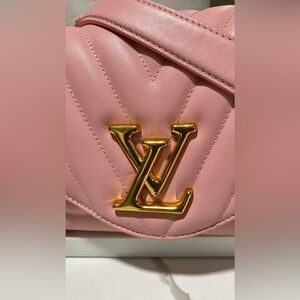 Authentic Louis Vuitton wave leather calf bag